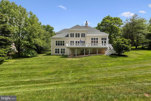 1418 Woodhurst Blvd, Mclean, VA 22102 - rear view of property with a chimney, a deck, a yard, and a patio