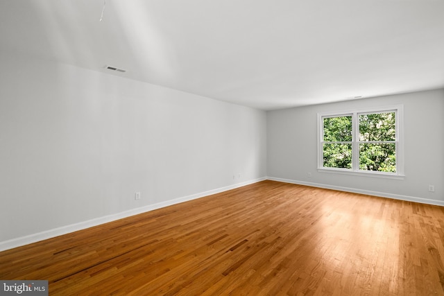 1418 Woodhurst Blvd, Mclean, VA 22102 - unfurnished room featuring wood finished floors and baseboards
