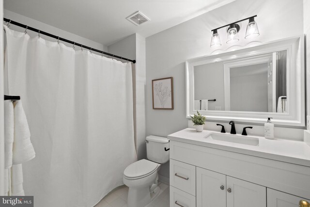 1418 Woodhurst Blvd, Mclean, VA 22102 - bathroom featuring toilet, vanity, and tile patterned flooring