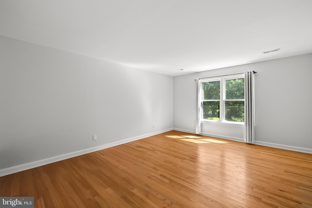 1418 Woodhurst Blvd, Mclean, VA 22102 - empty room featuring light wood finished floors and baseboards
