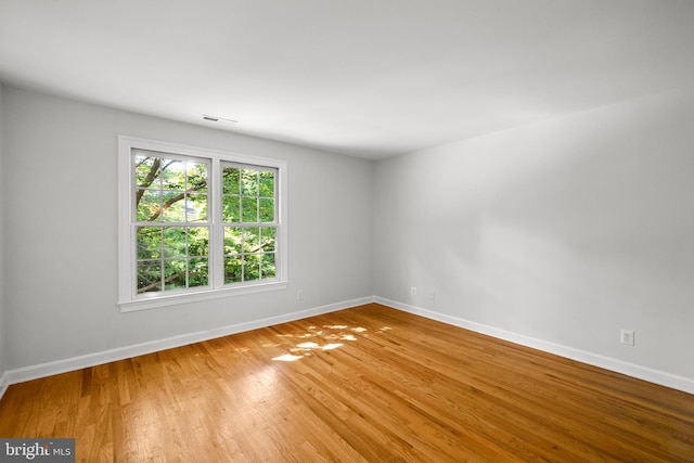 1418 Woodhurst Blvd, Mclean, VA 22102 - spare room featuring baseboards and light wood-style flooring