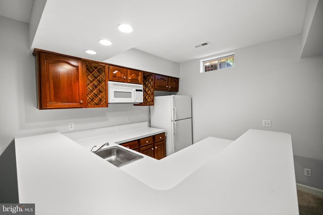 1418 Woodhurst Blvd, Mclean, VA 22102 - kitchen featuring white appliances, a sink, recessed lighting, light countertops, and carpet