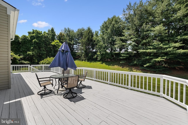 1418 Woodhurst Blvd, Mclean, VA 22102 - wooden deck featuring outdoor dining space, a yard, and view of scattered trees