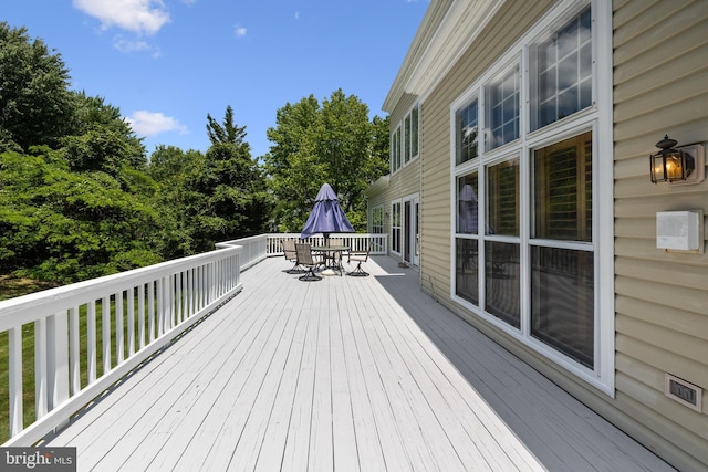 1418 Woodhurst Blvd, Mclean, VA 22102 - deck with outdoor dining space and view of scattered trees