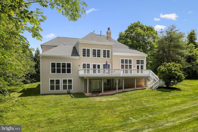 1418 Woodhurst Blvd, Mclean, VA 22102 - back of house with a lawn, a chimney, a deck, french doors, and roof with shingles