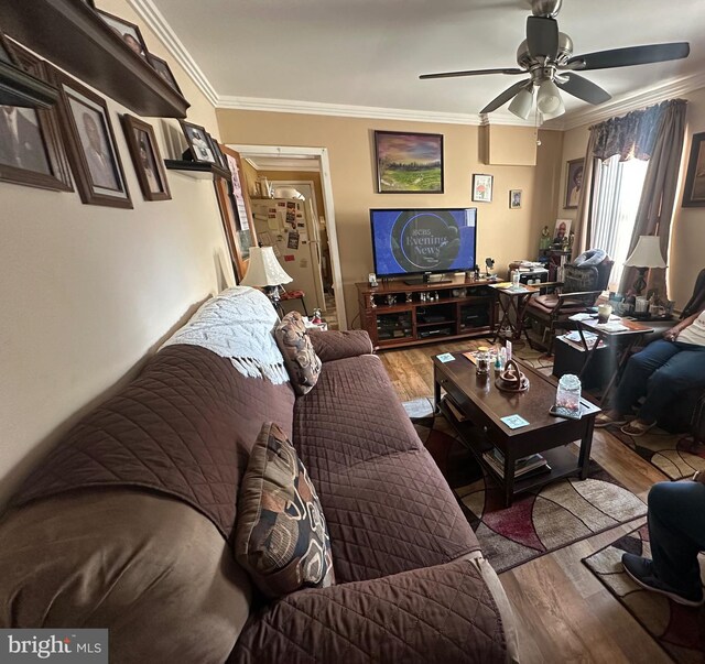 128 Thurlow St, Chester, PA 19013 - living area with crown molding, ceiling fan, and wood finished floors