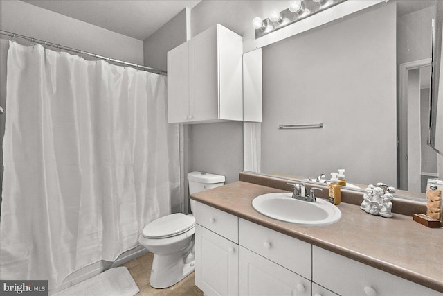 full bath with toilet, tile patterned floors, vanity, and a shower with shower curtain