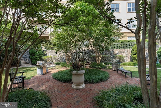 surrounding community with a patio area