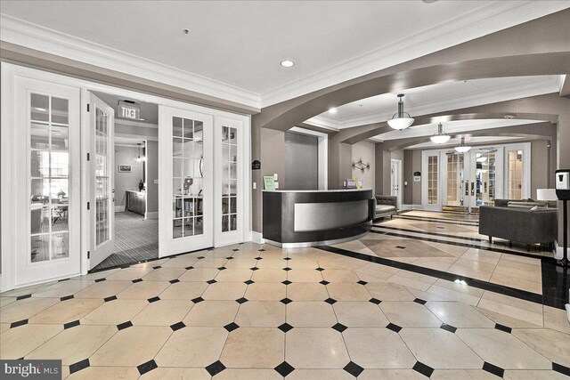 reception with arched walkways and french doors