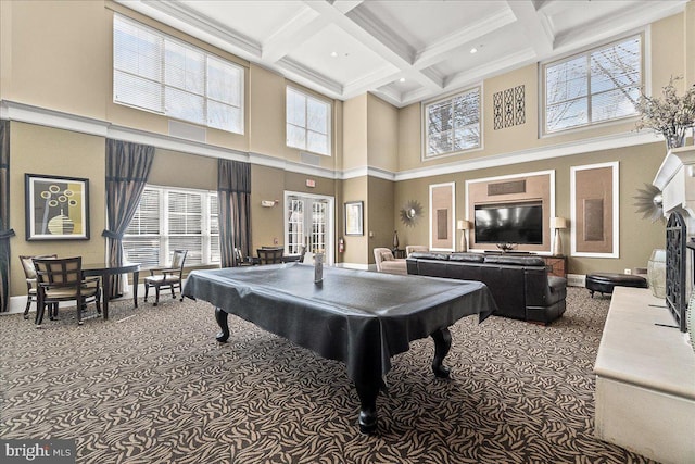 rec room with carpet, pool table, coffered ceiling, and a high ceiling
