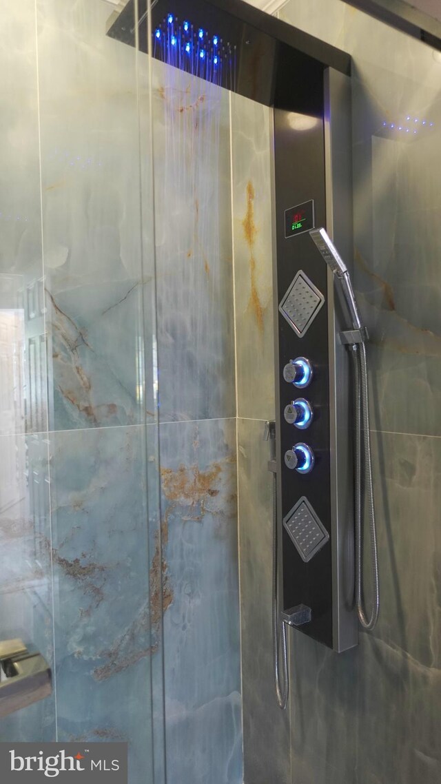 full bathroom featuring a walk in shower