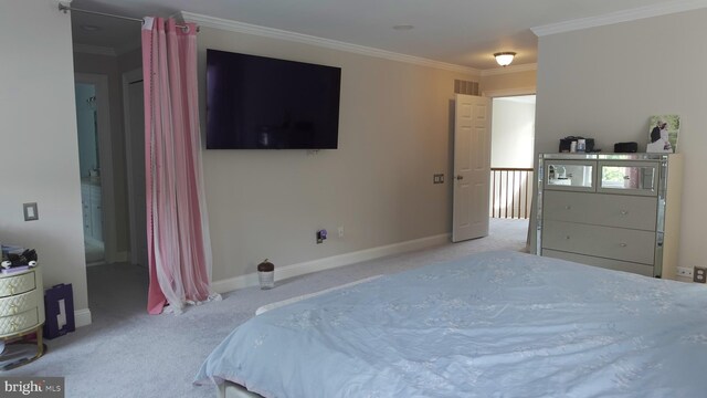 bedroom featuring carpet, visible vents, crown molding, and baseboards