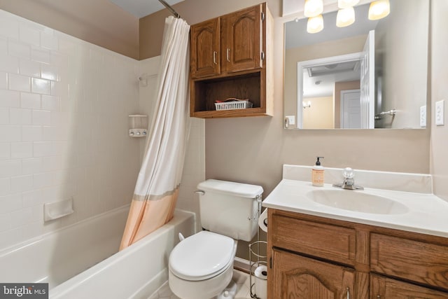 bathroom with toilet, shower / bath combo with shower curtain, and vanity