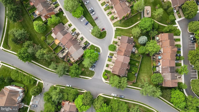 aerial overview of property's location with nearby suburban area