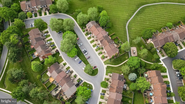 aerial view of property's location with nearby suburban area