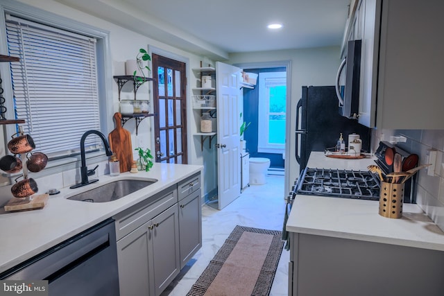 623 Marietta Ave, Lancaster, PA 17603 - kitchen with a sink, stainless steel appliances, gray cabinets, light countertops, and recessed lighting