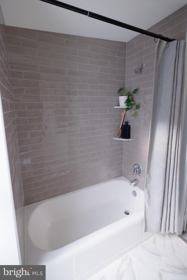 623 Marietta Ave, Lancaster, PA 17603 - bathroom with shower / tub combo with curtain and marble finish floors