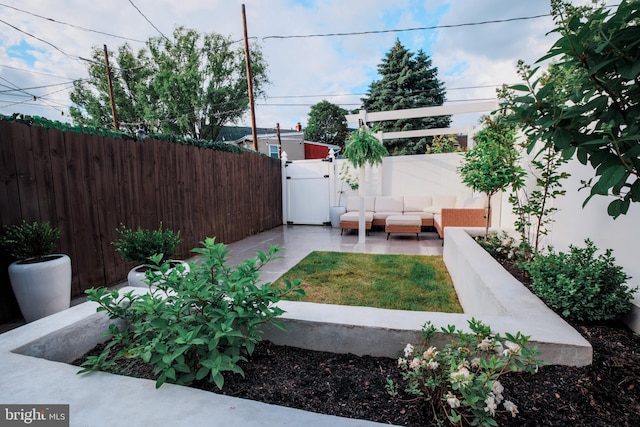 623 Marietta Ave, Lancaster, PA 17603 - fenced backyard with an outdoor hangout area, a gate, and a patio