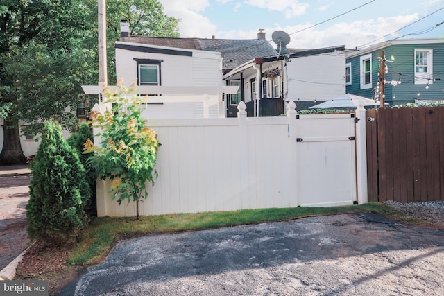 623 Marietta Ave, Lancaster, PA 17603 - view of home's exterior featuring a gate and a chimney