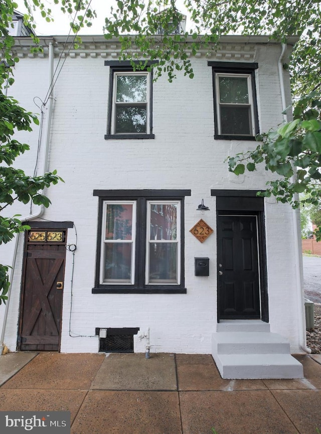 623 Marietta Ave, Lancaster, PA 17603 - view of front of house featuring brick siding and central air condition unit