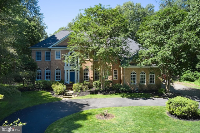 15410 River Rd, Darnestown, MD 20874 - colonial home with a front lawn and brick siding