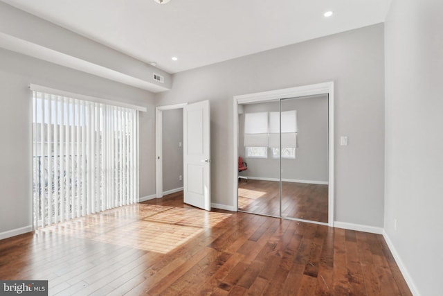 217 Grape St, Philadelphia, PA 19128 - unfurnished bedroom with recessed lighting, a closet, visible vents, baseboards, and hardwood / wood-style flooring