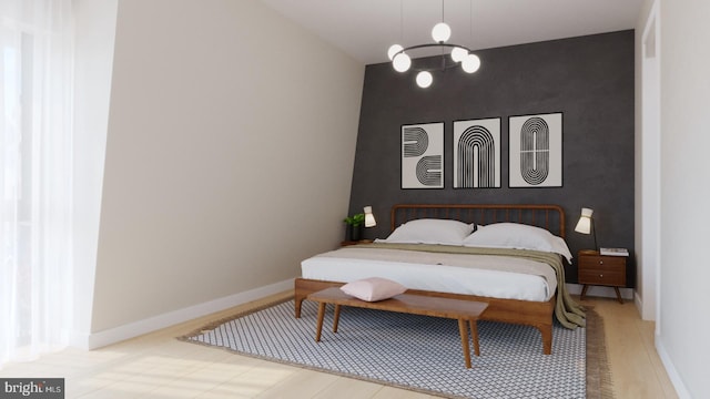 3401 W Lippincott St, Philadelphia, PA 19132 - bedroom with a chandelier, an accent wall, and baseboards