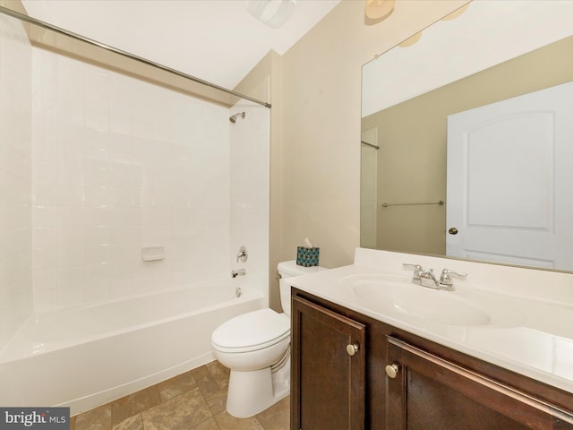 bathroom featuring vanity, toilet, and bathtub / shower combination