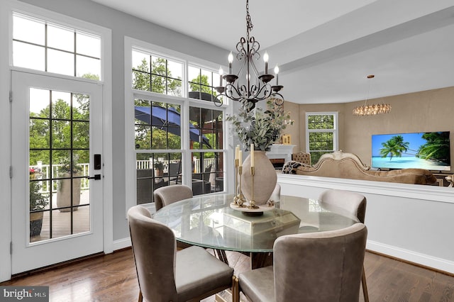 11162 Innsbrook Ct, Ijamsville, MD 21754 - dining room featuring a chandelier, dark wood-type flooring, and baseboards