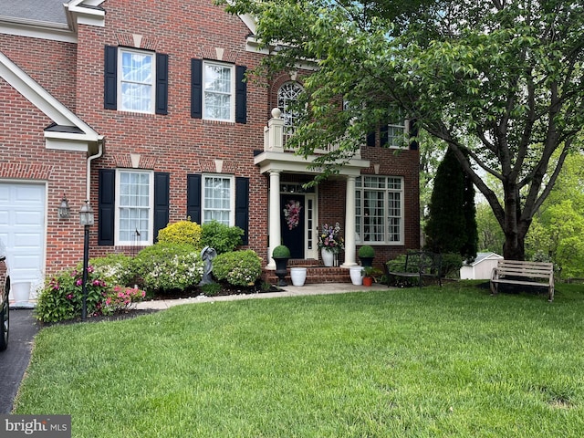 11162 Innsbrook Ct, Ijamsville, MD 21754 - colonial home with brick siding, a front lawn, and a garage