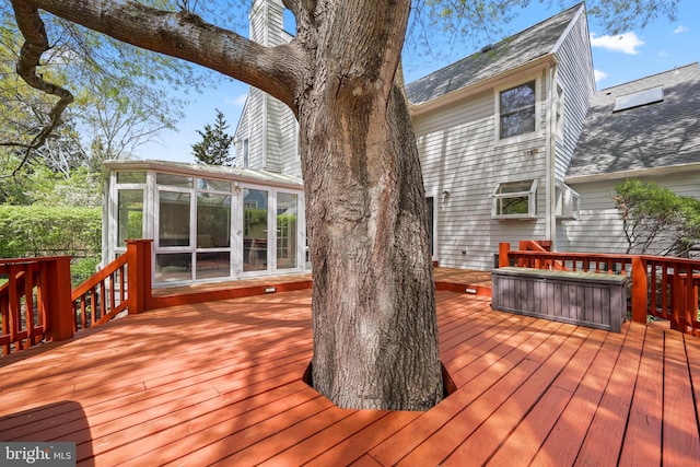 deck featuring a sunroom