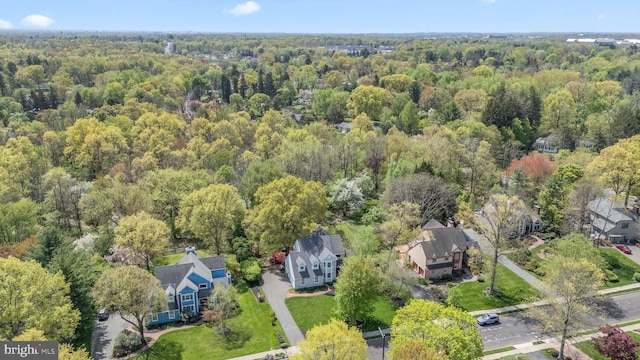 aerial view featuring a forest view