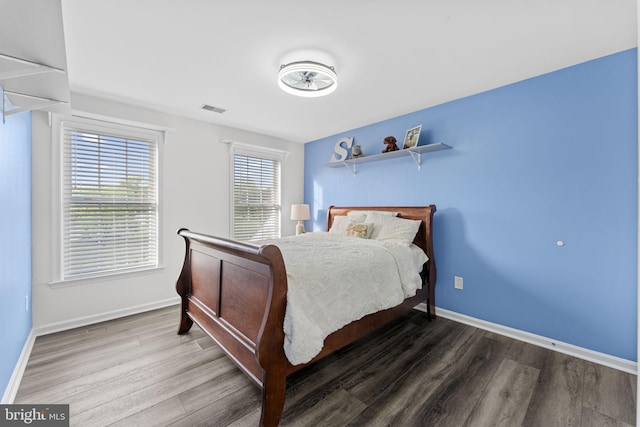 833 Gibbons Rd, Sykesville, MD 21784 - bedroom featuring visible vents, baseboards, and wood finished floors