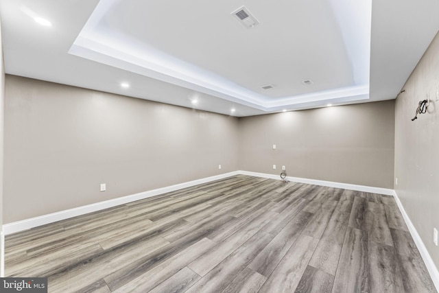 833 Gibbons Rd, Sykesville, MD 21784 - finished below grade area with baseboards, recessed lighting, wood finished floors, and visible vents