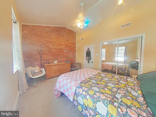 1231 S Clarion St, Philadelphia, PA 19147 - carpeted bedroom featuring brick wall, a ceiling fan, a closet, and vaulted ceiling