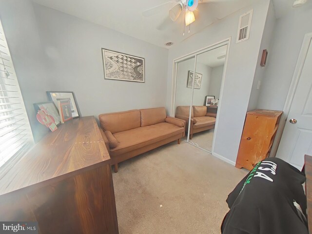 1231 S Clarion St, Philadelphia, PA 19147 - living area featuring a ceiling fan, light colored carpet, and baseboards
