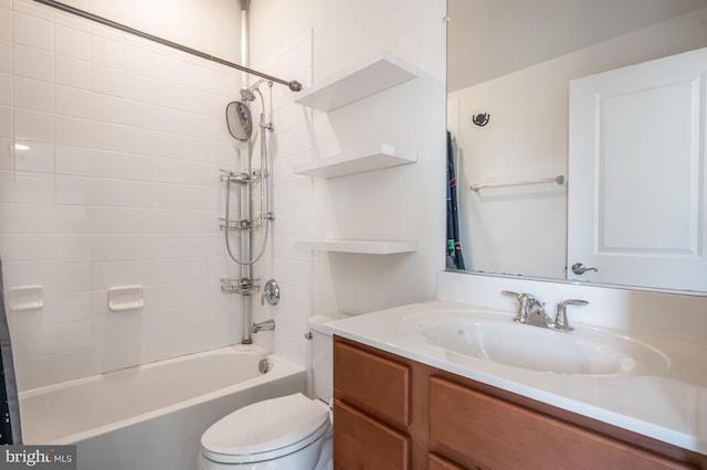 full bathroom with vanity, toilet, and shower / tub combination