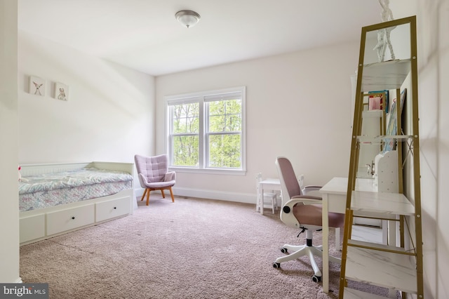 bedroom featuring carpet flooring and baseboards