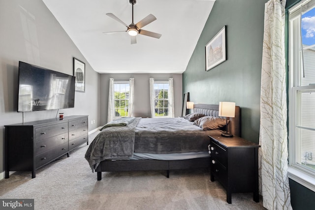 bedroom featuring carpet flooring, ceiling fan, and lofted ceiling