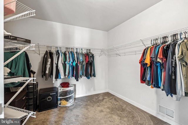 walk in closet with carpet flooring and visible vents