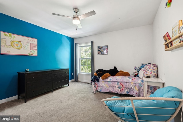 bedroom featuring a ceiling fan, baseboards, and carpet floors