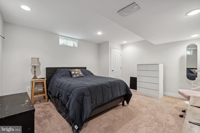 bedroom with recessed lighting, baseboards, and carpet floors