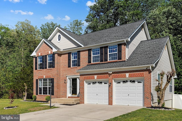 traditional-style house with brick siding, a front yard, concrete driveway, and roof with shingles