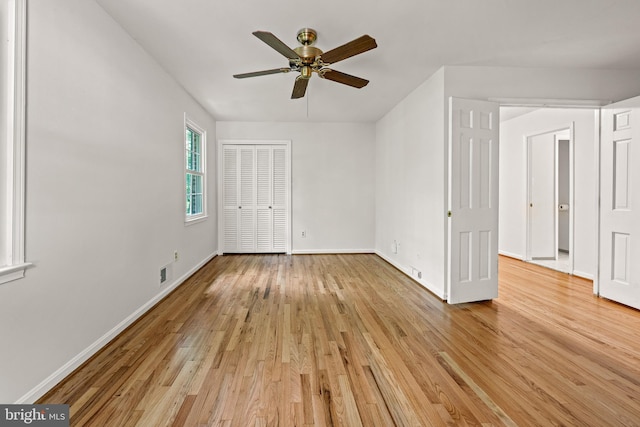 5420 Well Spring Rd, La Plata, MD 20646 - unfurnished bedroom with light wood-style floors, baseboards, ceiling fan, and a closet
