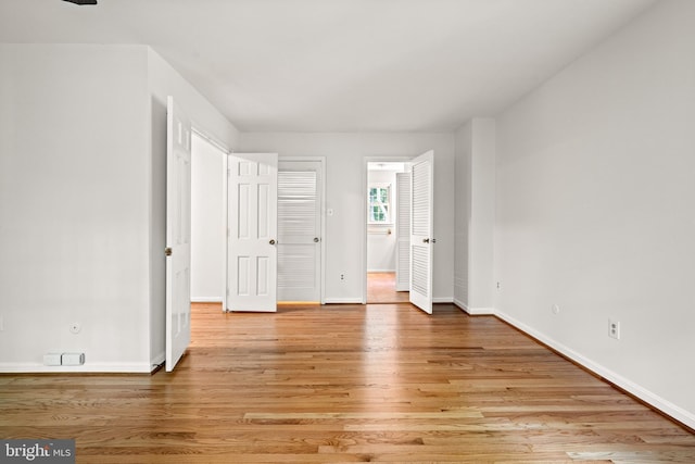 5420 Well Spring Rd, La Plata, MD 20646 - unfurnished bedroom featuring light wood-type flooring and baseboards