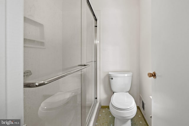 5420 Well Spring Rd, La Plata, MD 20646 - bathroom featuring toilet, a stall shower, baseboards, and tile patterned flooring