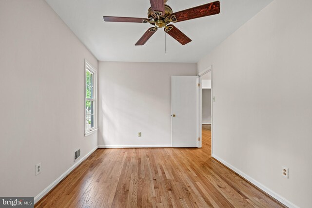 5420 Well Spring Rd, La Plata, MD 20646 - unfurnished room with wood finished floors, baseboards, and ceiling fan