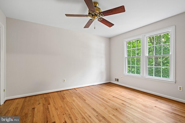 5420 Well Spring Rd, La Plata, MD 20646 - empty room featuring baseboards, light wood finished floors, and ceiling fan