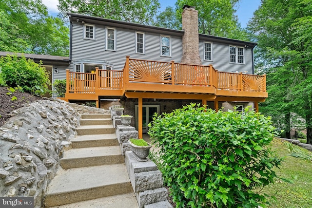 5420 Well Spring Rd, La Plata, MD 20646 - rear view of house with a chimney and a deck