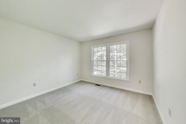 12148 Darnley Rd, Woodbridge, VA 22192 - carpeted spare room with baseboards
